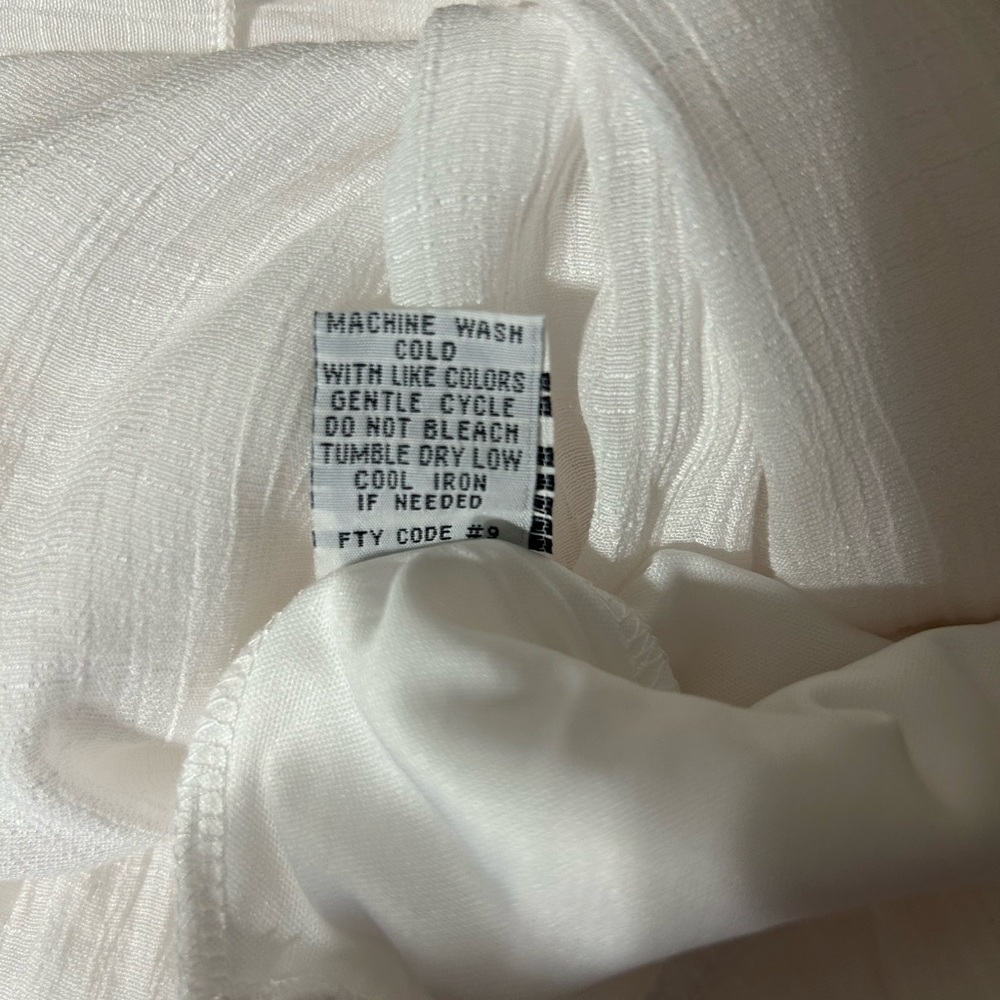 Elegant White Smocked Maxi Dress - Picture 8 of 10